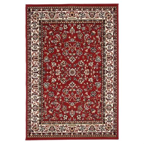 Exemple de tapis d'herbe avec un motif de papillon appliqué