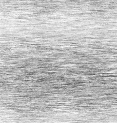 Schéma des étapes pour créer une texture métal brossé dans Photoshop avec les filtres Nuages, Ajout de bruit et Flou directionnel.